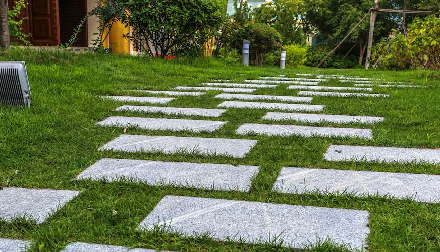 how-to-mow-grass-around-pavers