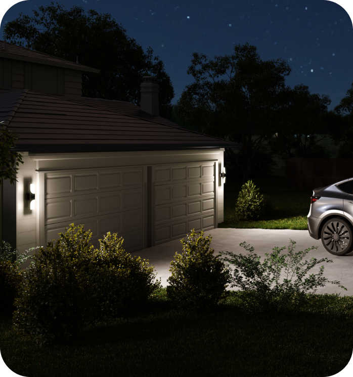 eufy mit beleuchteter Garage und geparktem Auto bei Nacht